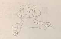 A Tubershuckle, seemingly dried out and dead, lies motionless with a cork stuck in its feeding tube